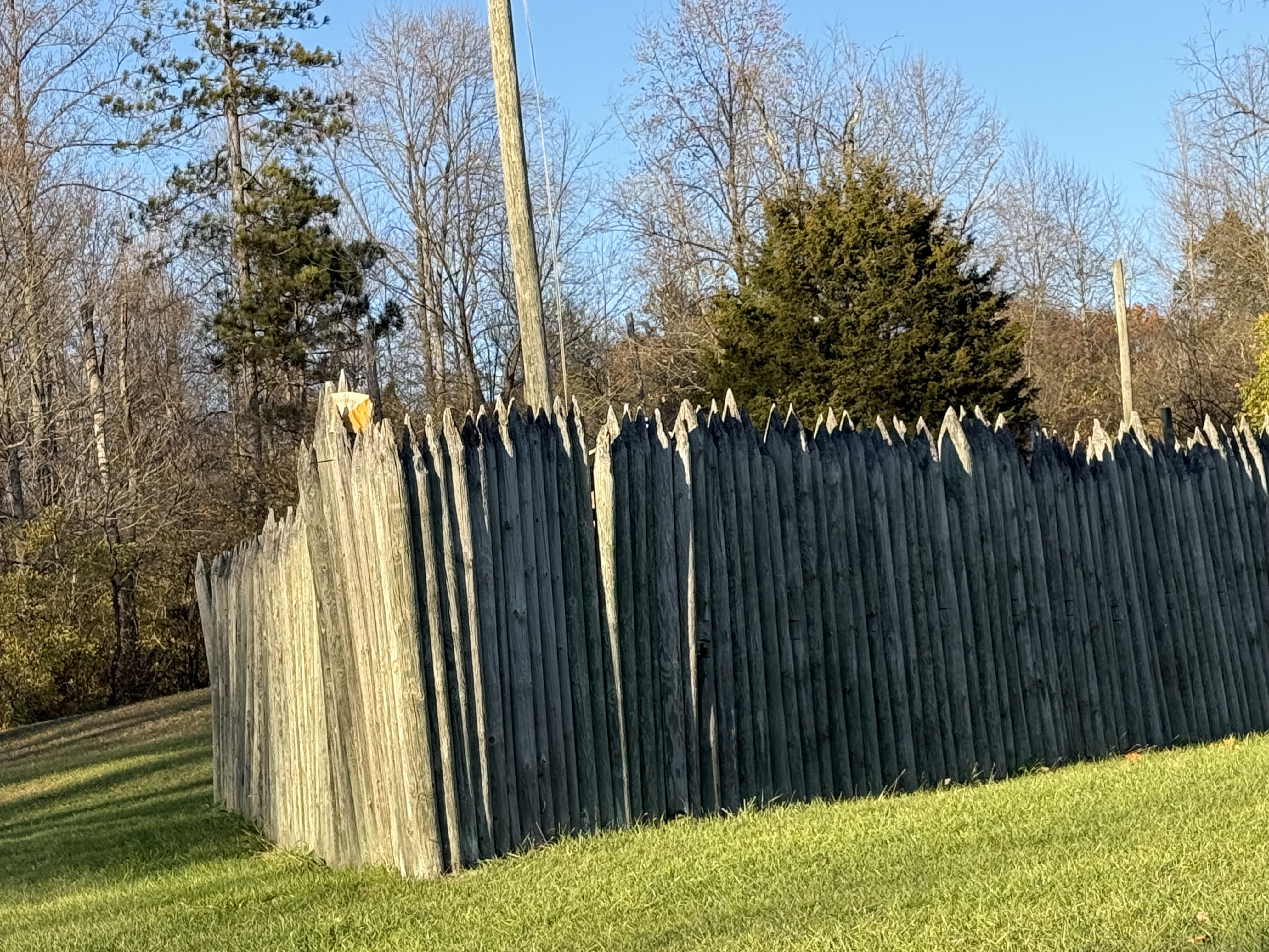 A view of the outside of the wooden palisade wall of the fort at George Rogers Clark Park.
